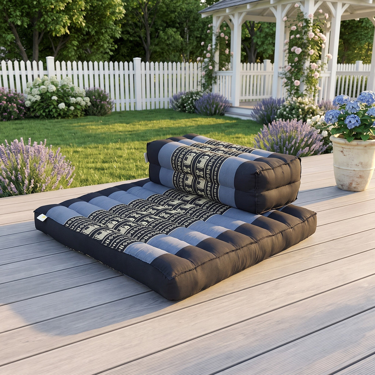 Blue elephant Zafu and Zabuton meditation cushion set on a sunlit garden deck