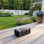 Blue elephant pattern yoga block on a sunlit garden deck