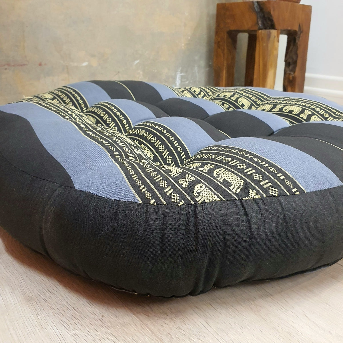 Blue Elephant jumbo round Thai kapok meditation cushion, low side detail